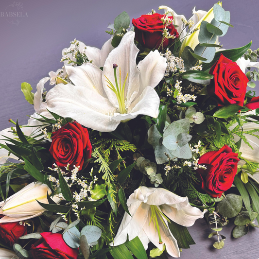 Eternal Elegance coffin spray with white lilies and red roses, available at Beckenham flowers shop